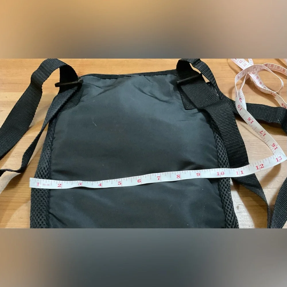 Pet front and back black small pet backpack/carrier XL for small pets.